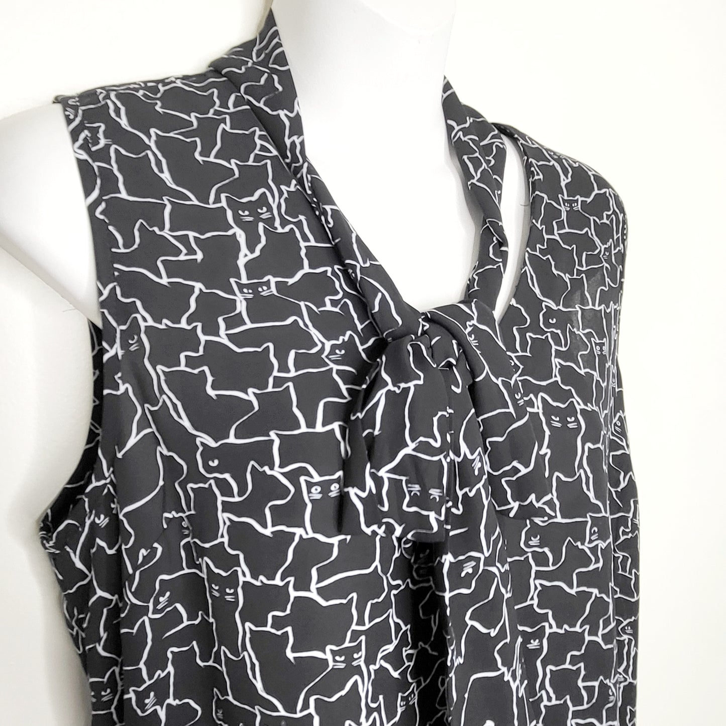 JRB2 - RW and Co black sleeveless blouse with cats.  Size medium