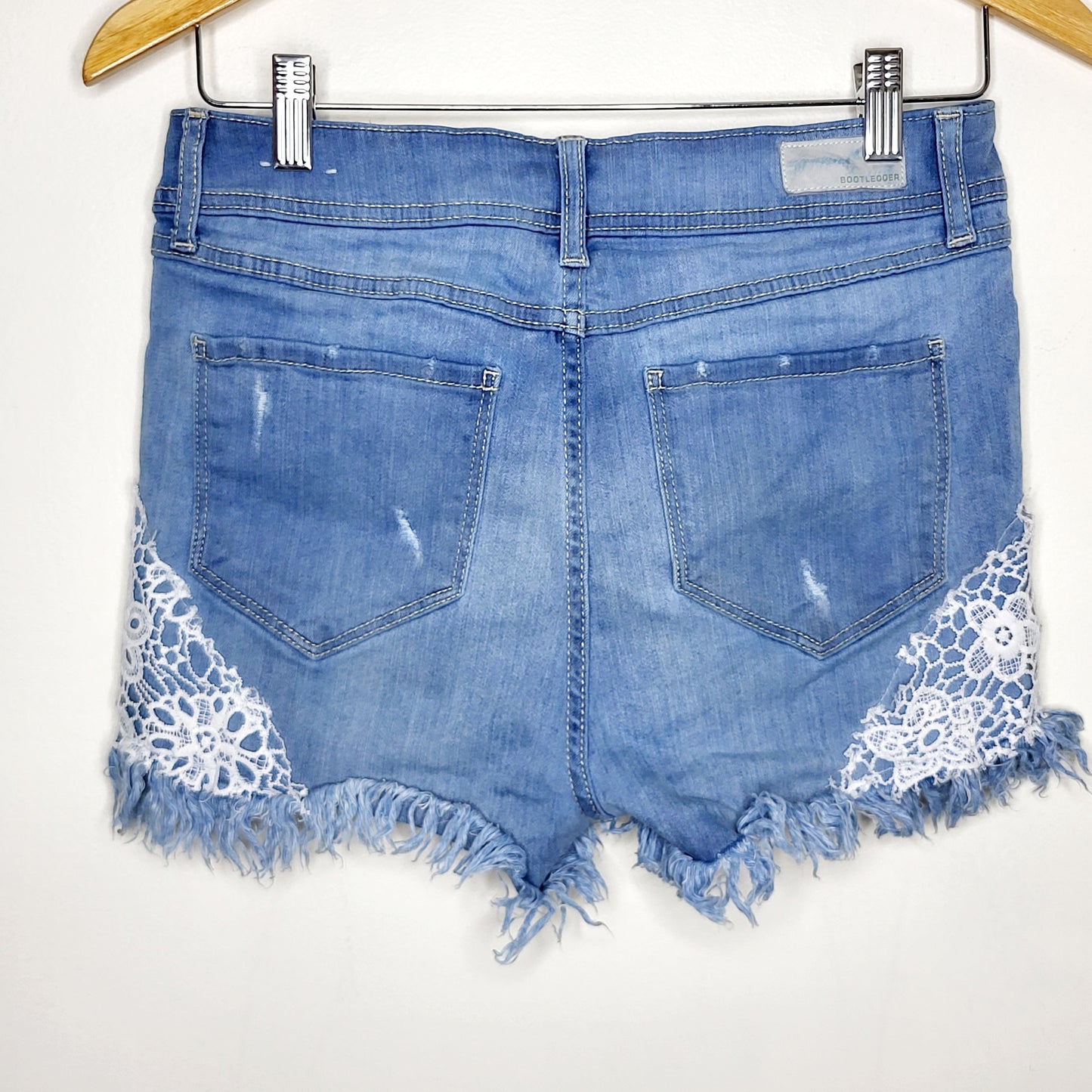 LCRW1 - Bootlegger denim "shortie high rise" shorts with lace detail. Size 28