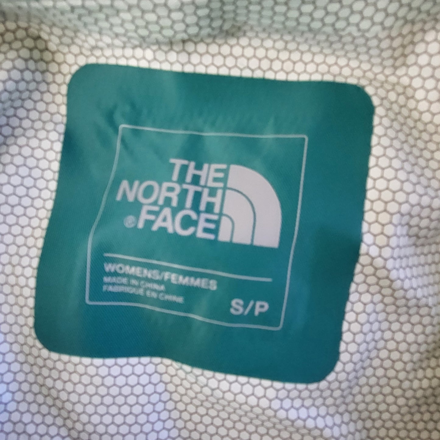 LCRW1 - The North Face turquoise rain jacket. Size small