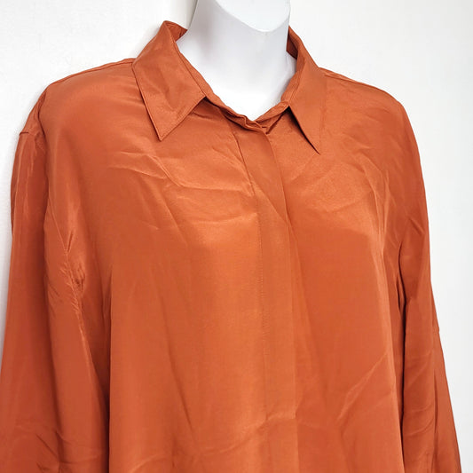 ALXS1 - Aritzia Babaton orange loose fit silk button down blouse. Size medium