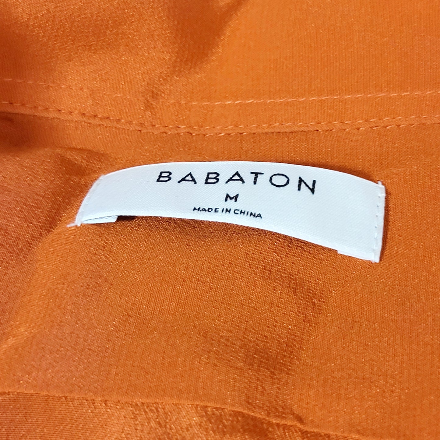 ALXS1 - Aritzia Babaton orange loose fit silk button down blouse. Size medium