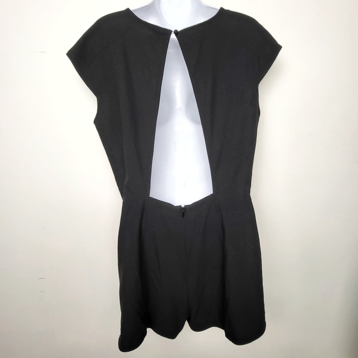 BBIN1 - Guess black open back romper. Size 10