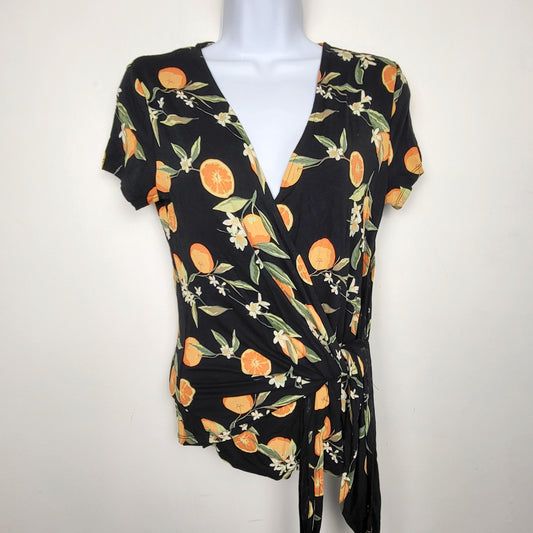 KTRC1 - Kismet black rayon orange printed wrap top. Size XS