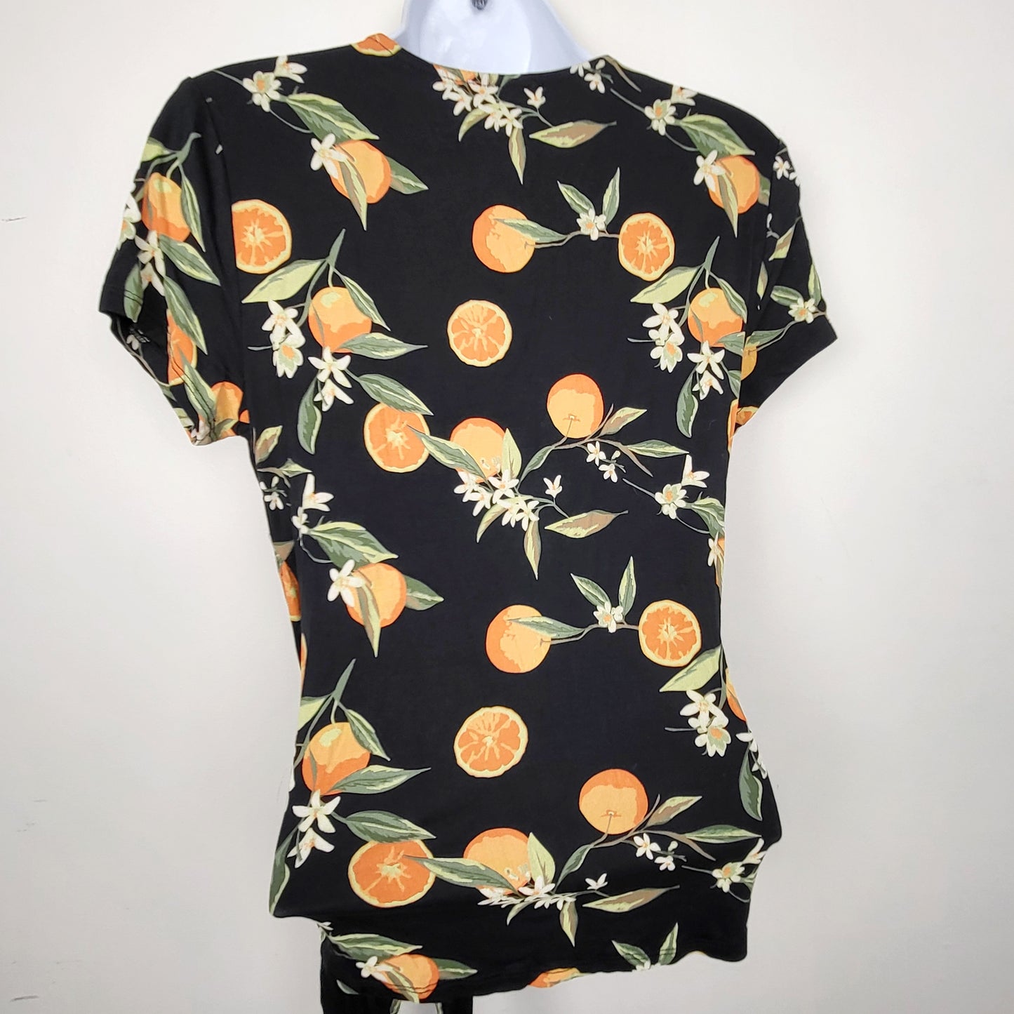 KTRC1 - Kismet black rayon orange printed wrap top. Size XS