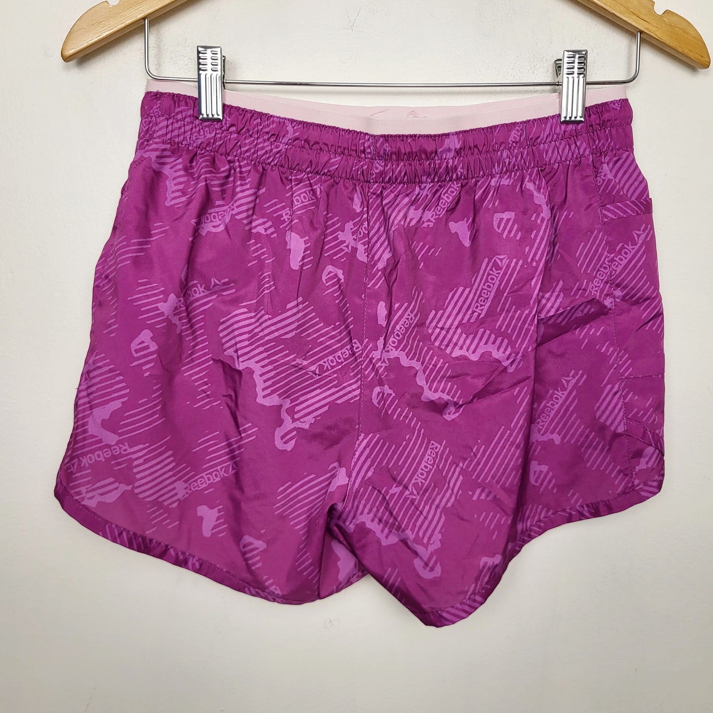 AGLL1 - Reekbok purple patterned running shorts. Size small